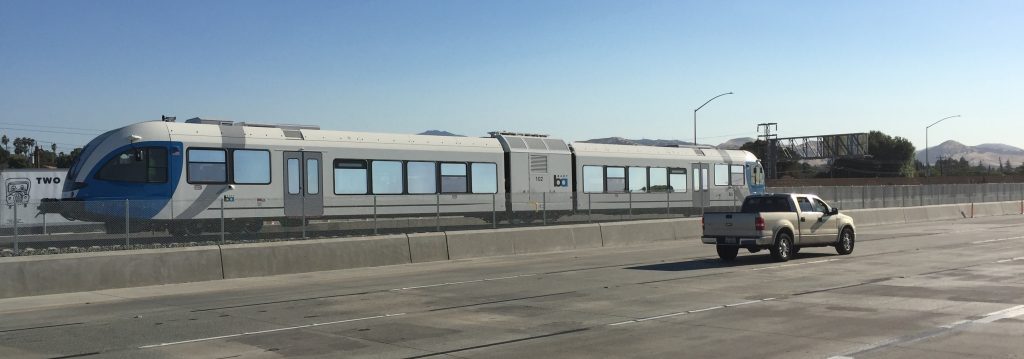 A two-car eBART train undergoes testing in the middle of Highway 4 between Hillcrest Avenue and A Street/Lone Tree Way on Friday evening, July 1st. photo by Allen Payton